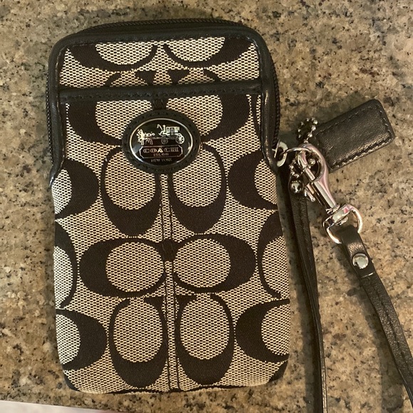 Beautiful Coach phone wallet carrier